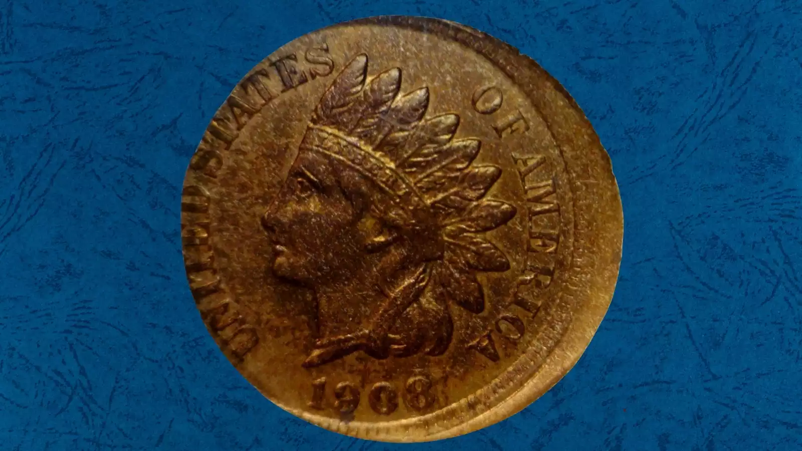 1908 Indian Head Penny off-center strike error showing crescent of blank planchet and partial design